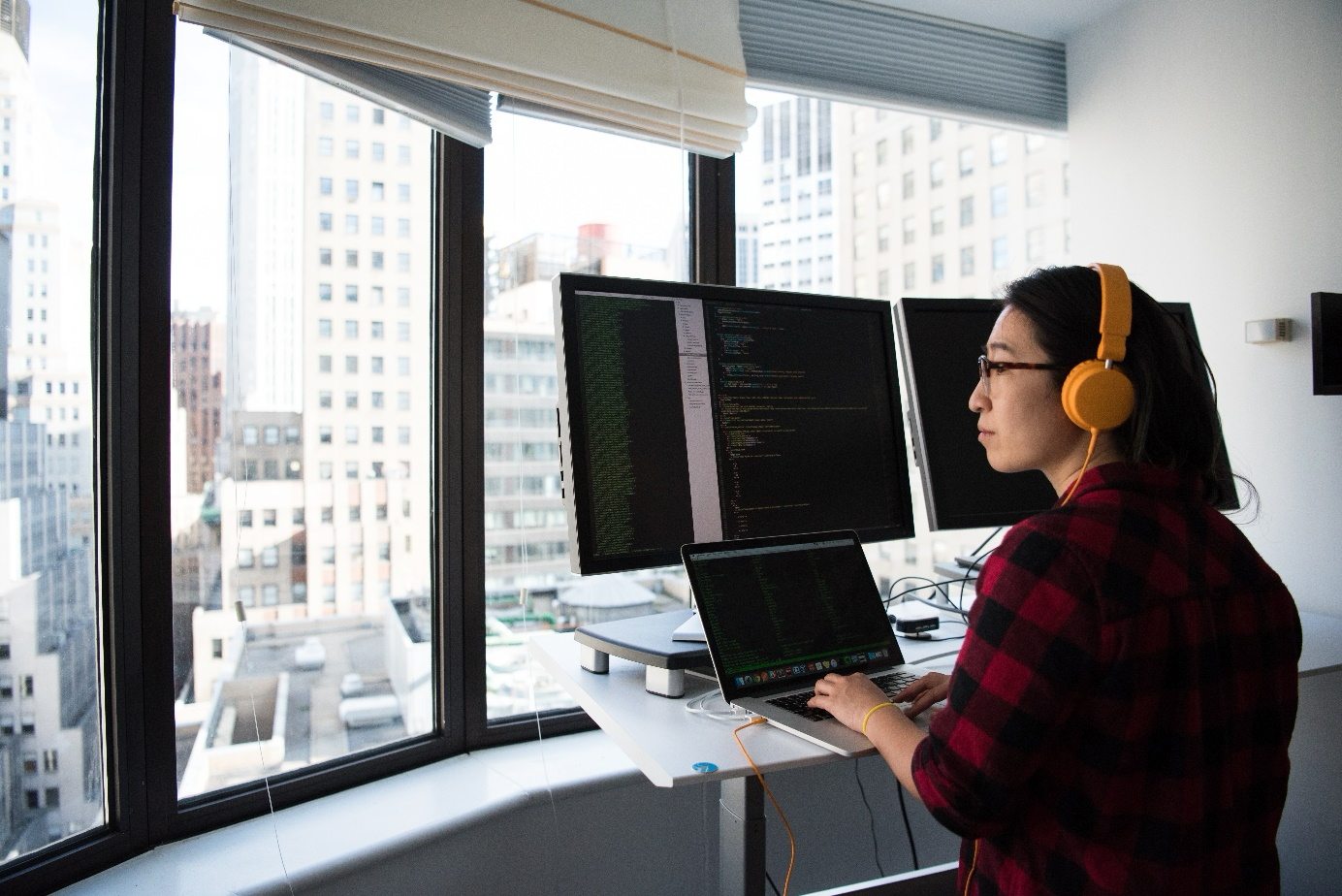Person working while standing at their desk